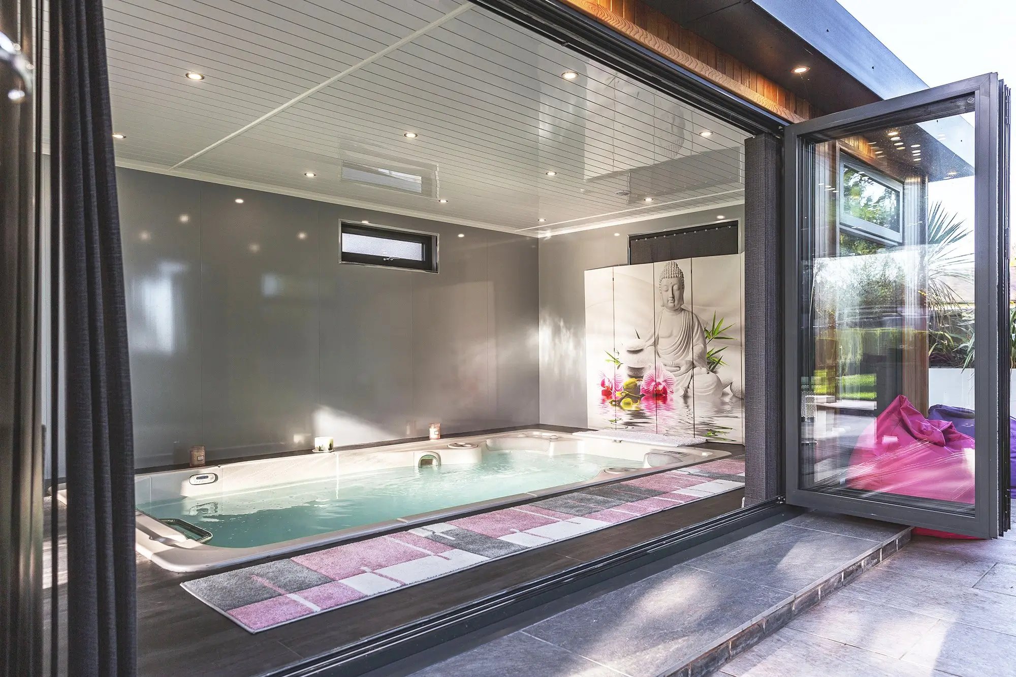 Large garden spa building with bifold doors and hydropool midlands swim spa 