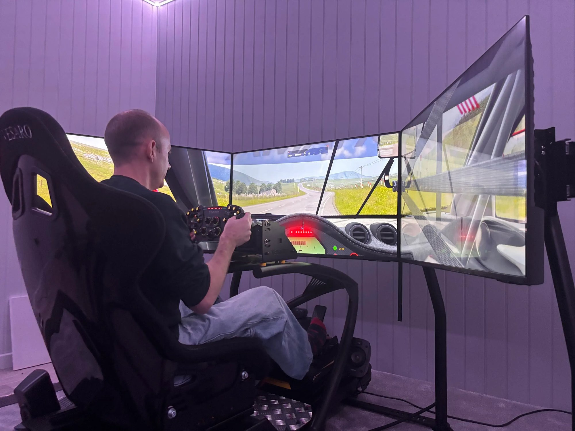 man using a driving simulator