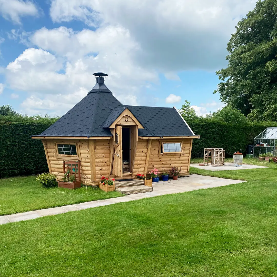 Exterior of a BBQ cabin garden bar building