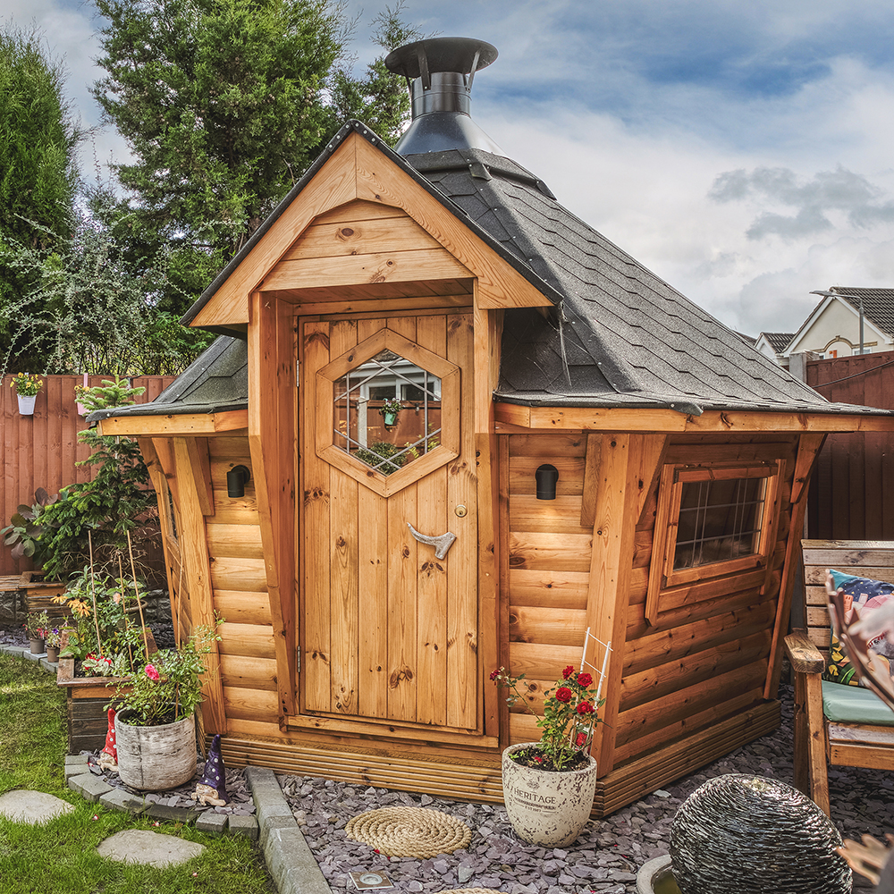 Small bbq cabin hut in small urban garden