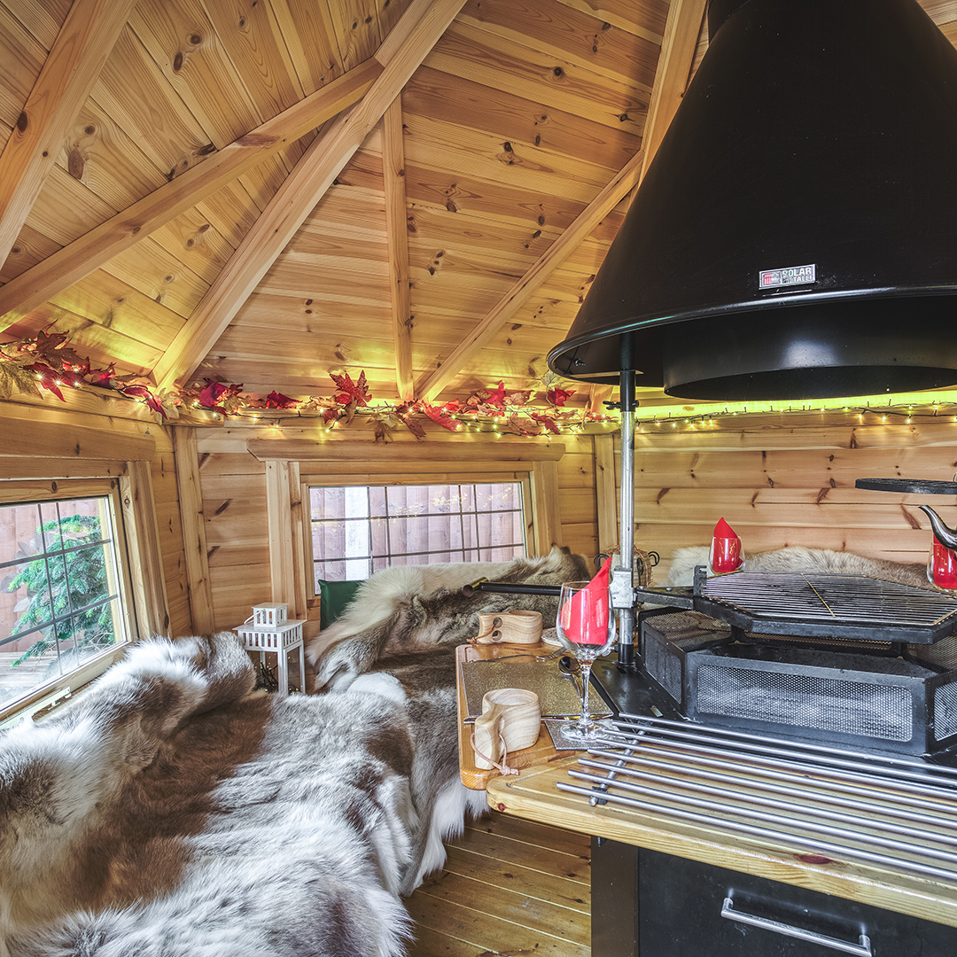 Interior of a BBQ hut grill house with autumnal fairy lights