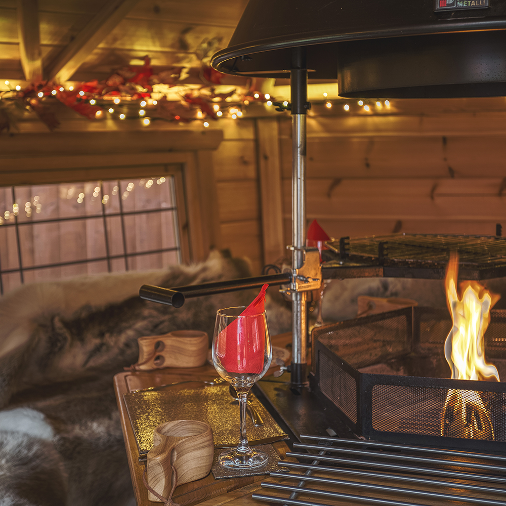 Interior of bbq cabin with fire lit