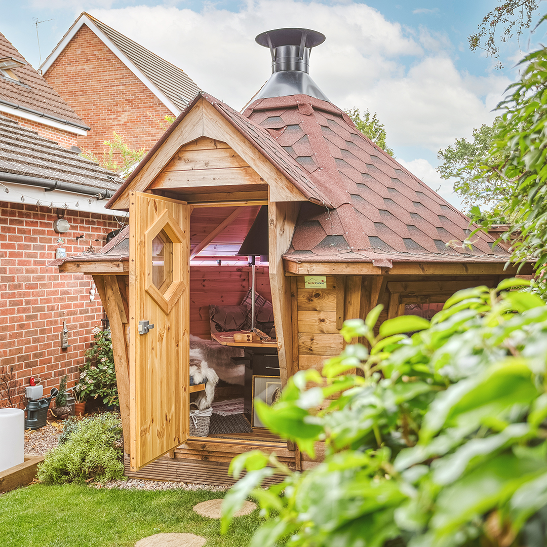 small bbq grilling cabin in modern garden