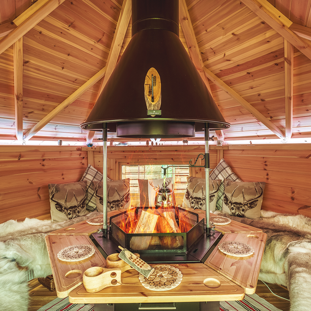 Interior of a BBQ hut grill house with roaring fire