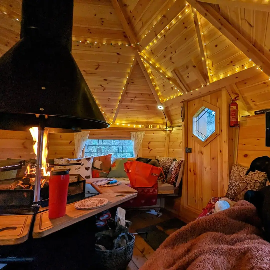 Internal shot of a BBQ cabin with fairy lights