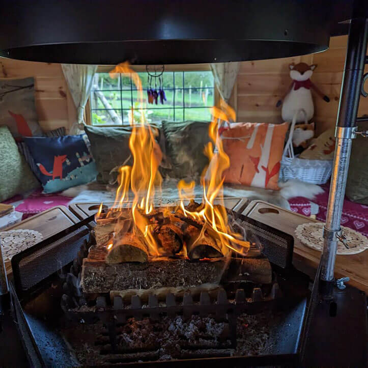 Roaring fire inside a BBQ grill house