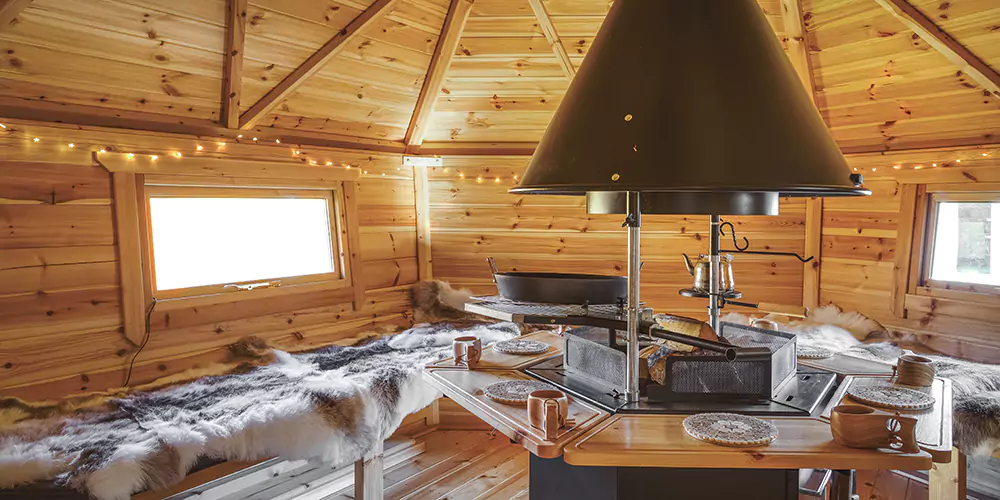 cosy arctic cabin with fairy lights