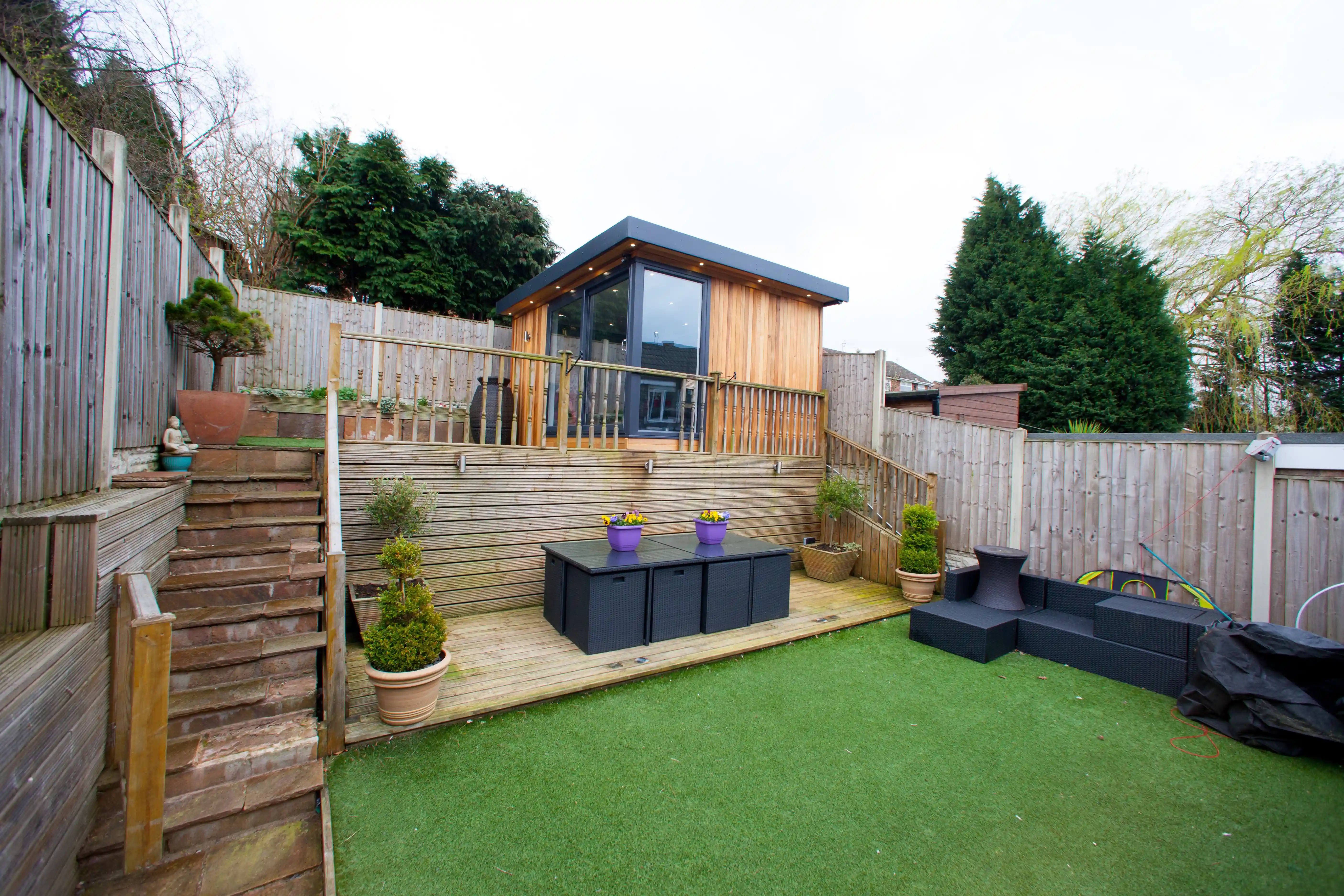 Cabin Master Cedar Garden Building Extra Room Summerhouse with ornamental pot and grassy area 