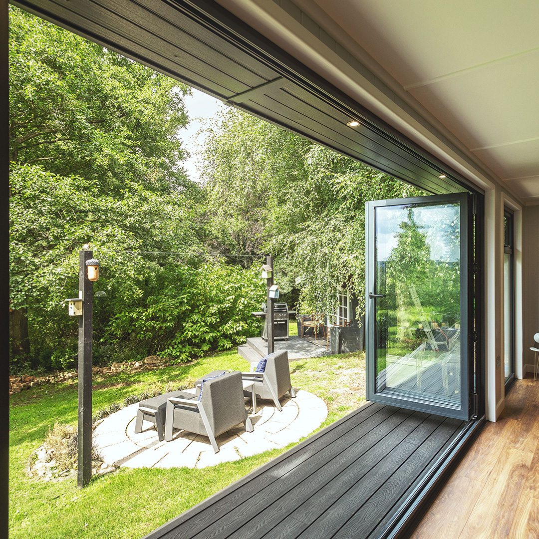 Open bi-fold doors shot from inside large garden roome