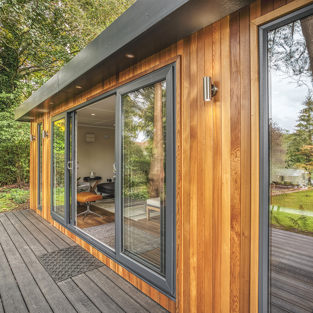 Cabin Master Home Cinema Room External View with Patio 