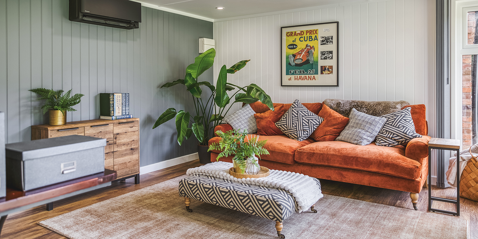 Interior of a garden room lounge with warm cosy decor & heating