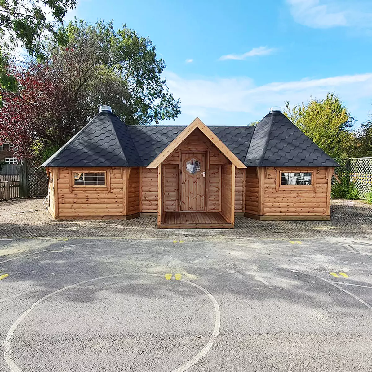 Connected scandinavian inspired school cabins made of timber