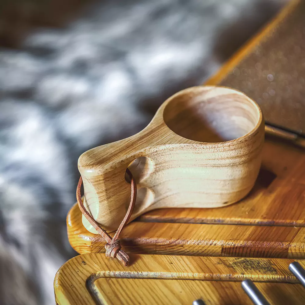 close up of a kuksa cup inside an Arctic Cabin