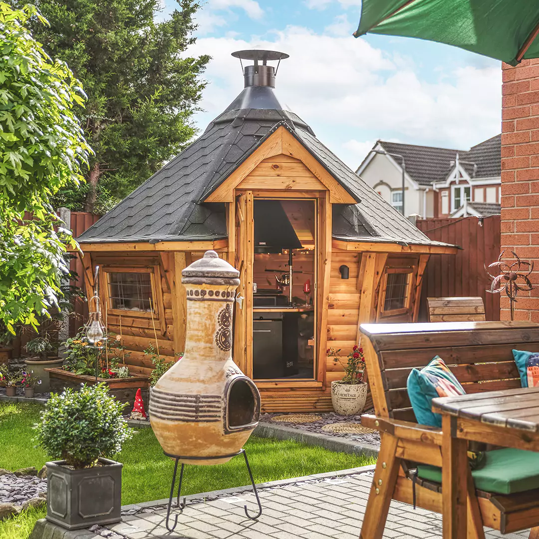 outside shot of an Arctic Cabins grill hut in garden