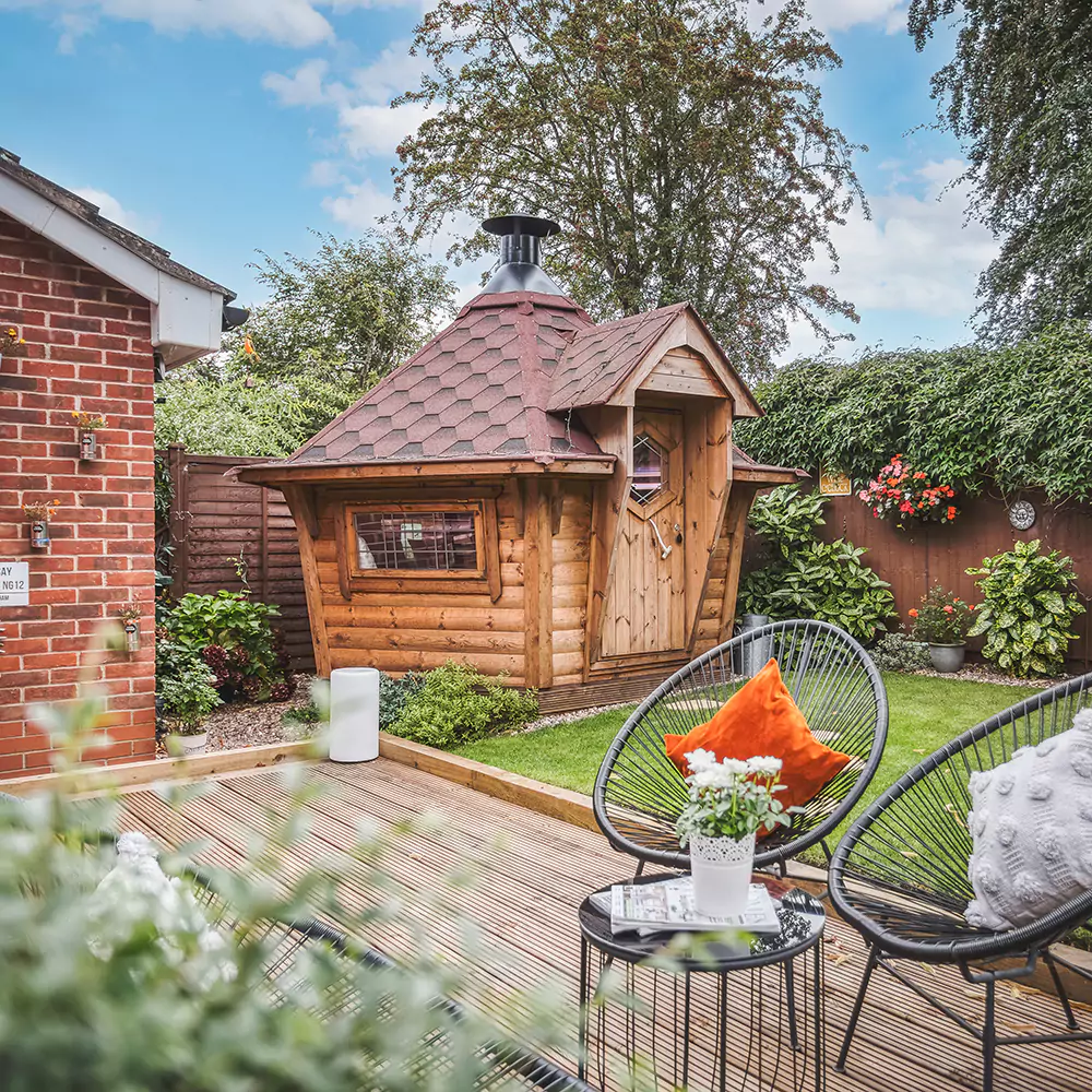 Small BBQ grill hut with red roof