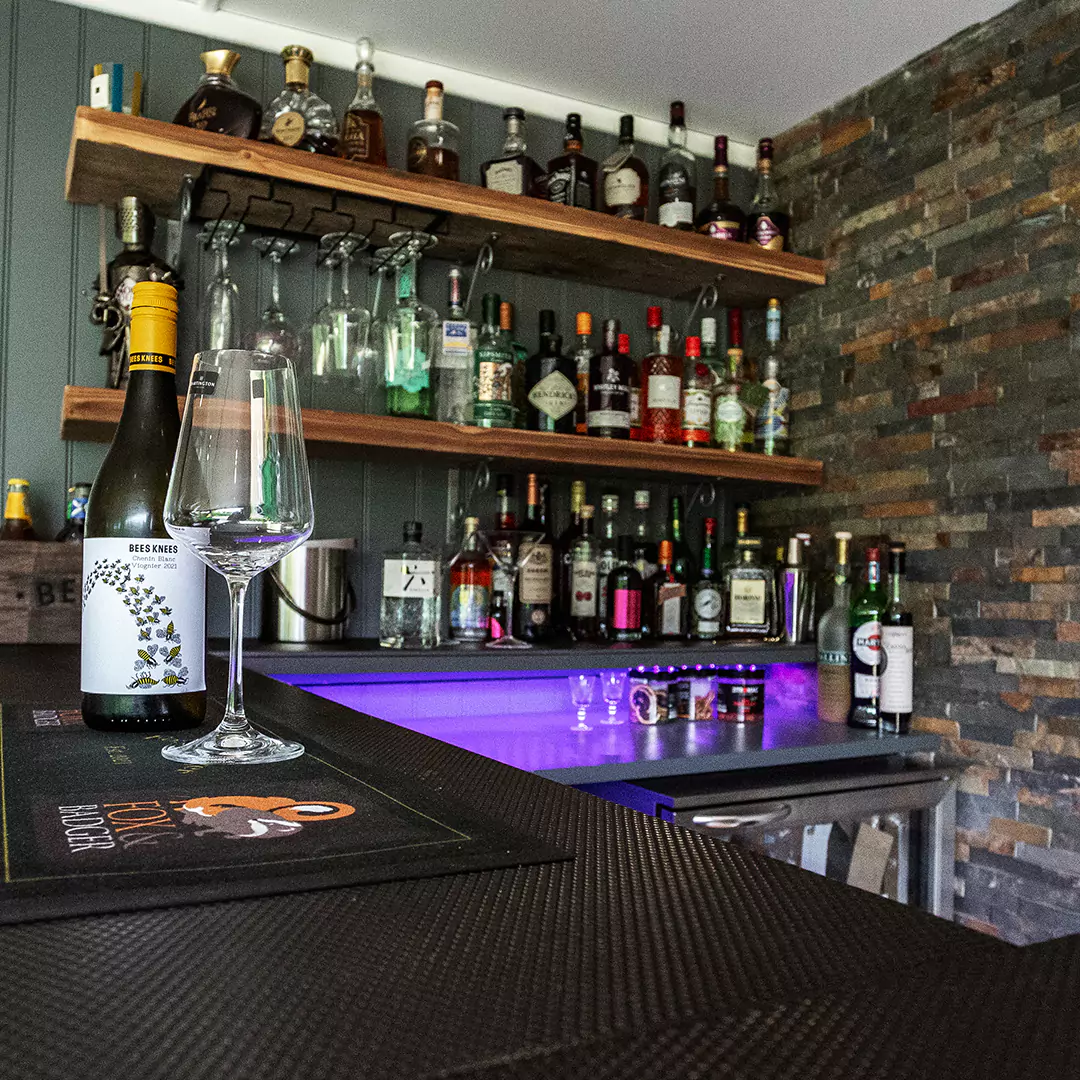 Interior of a garden bar bottle shop area