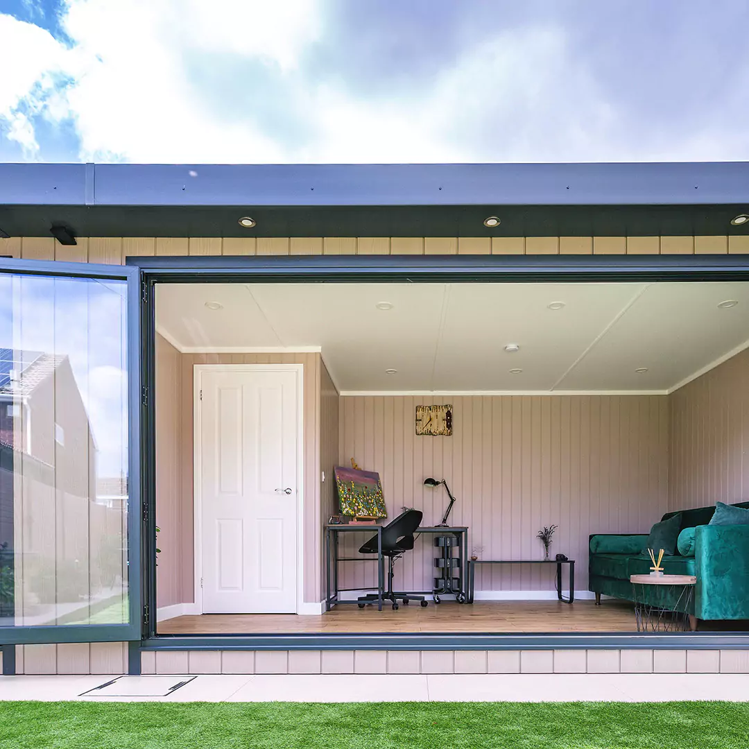 looking into a garden room with fully extended bifolds