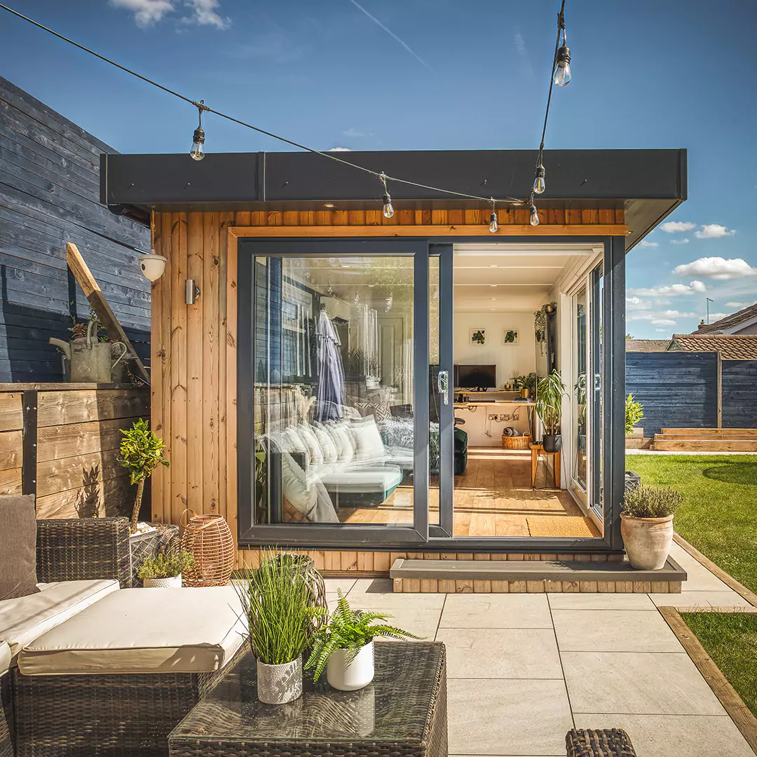 Redwood timber garden room on bright sunny day