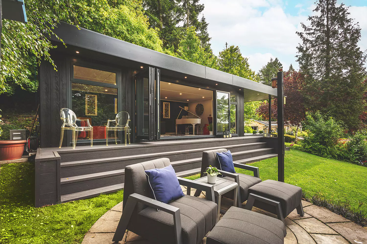 Cabin Master veranda garden room in black cladding