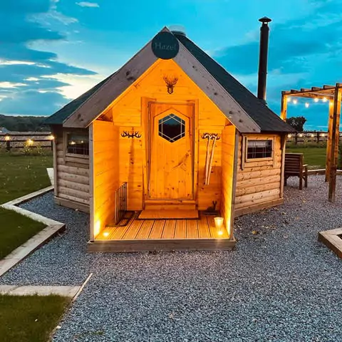 shot at dusk of a glamping hut