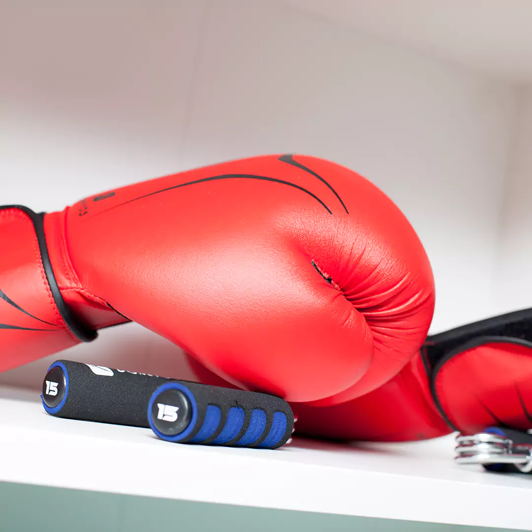 close up of red boxing gloves