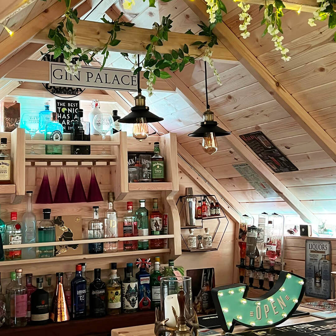 Interior on an Arctic Cabins garden bar with hanging wisteria for decoration