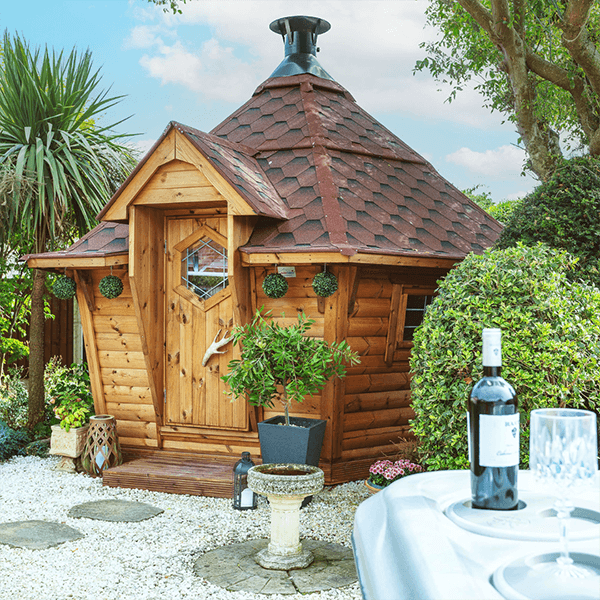 Arctic Cabins BBQ hut with red roof