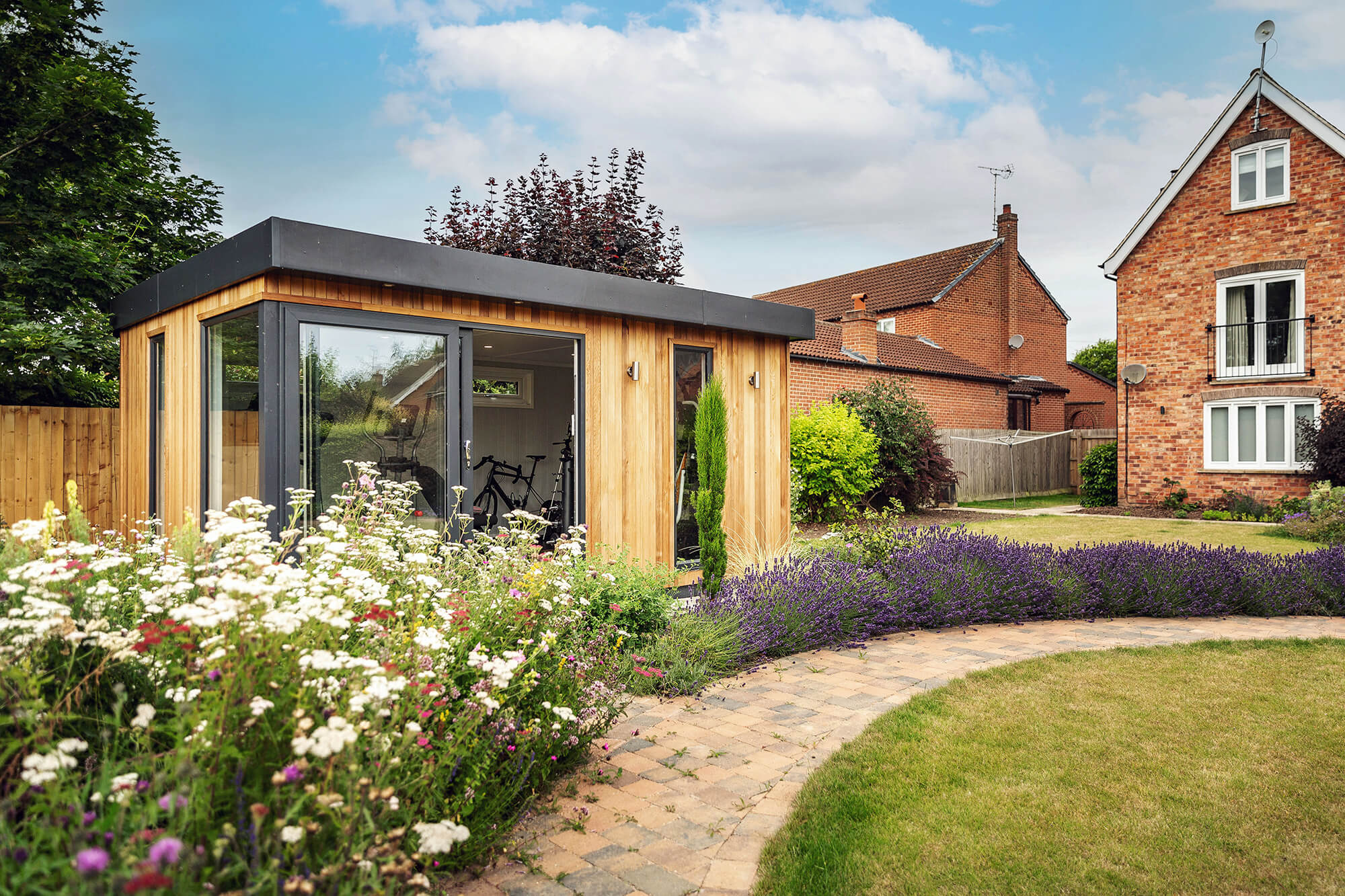 Garden room gym in beautiful english garden setting
