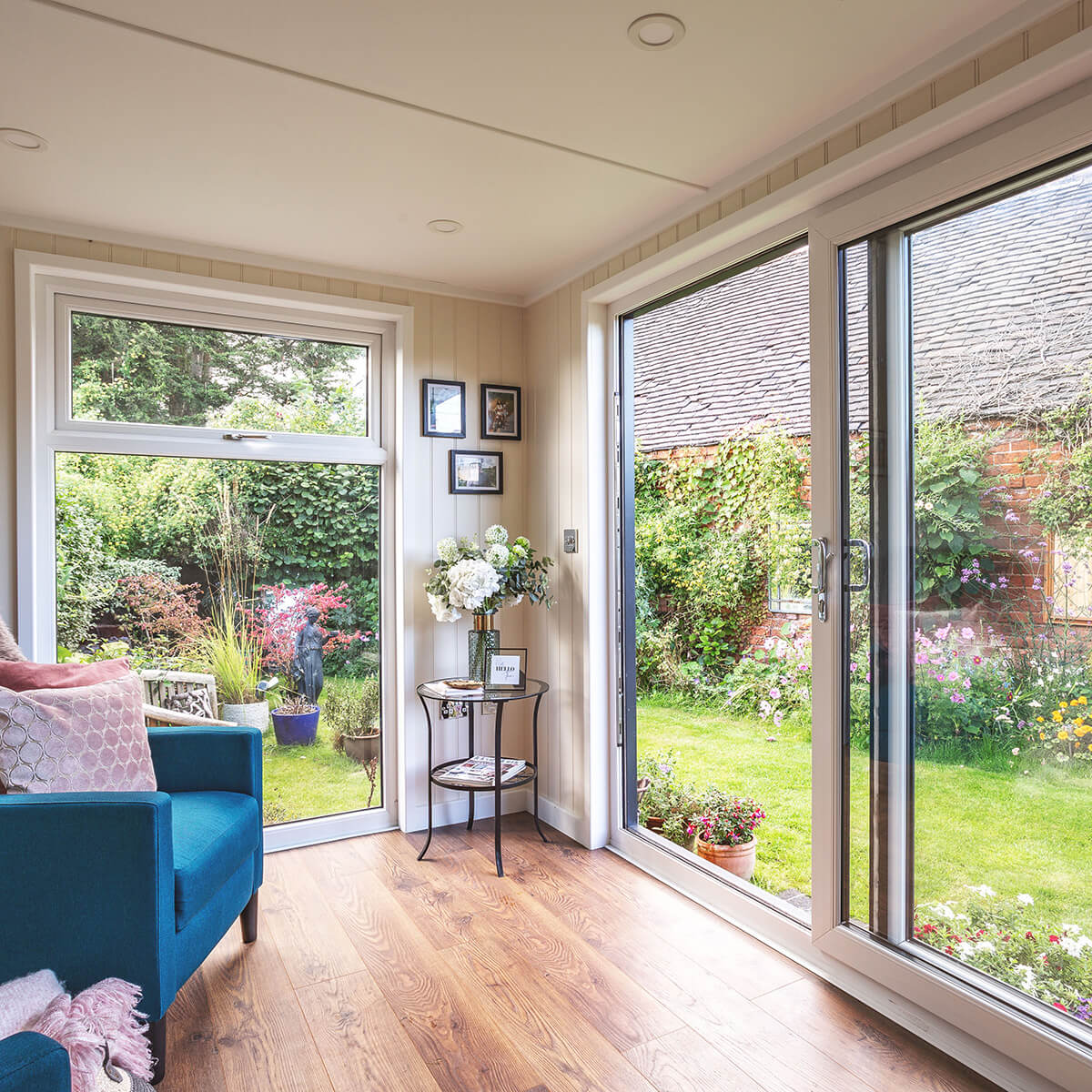 Looking outside the corner windows of a a traditional summerhouse