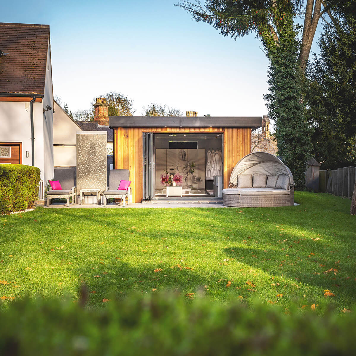 Garden therapy spa room with open bifold doors