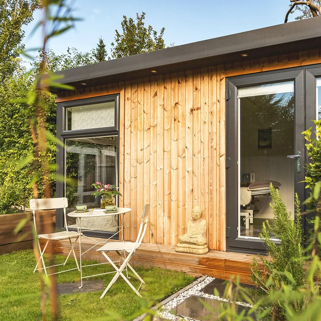 Timber outdoor building with bistro table outside