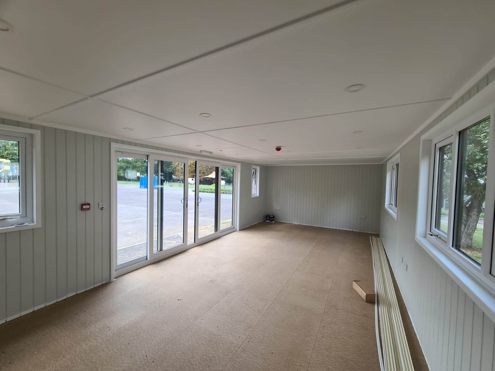 Cabins For Schools Oakridge School Marley Building with sage green interior