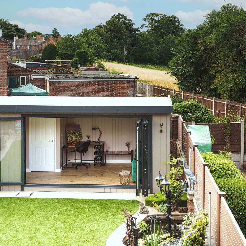 Overhead shot of large marley garden room with view of lawn and potted plants