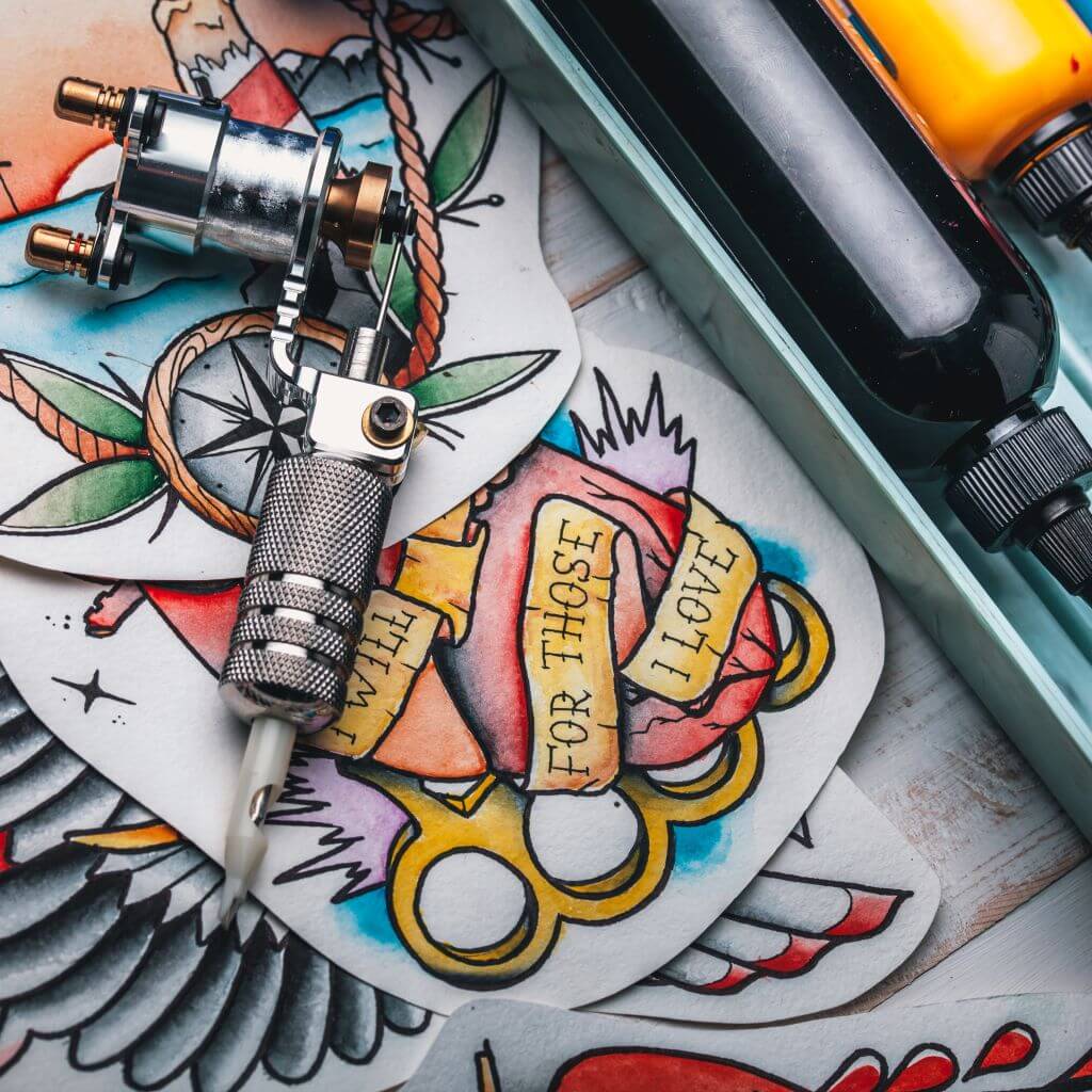 tattoo needle with paints and stencil 