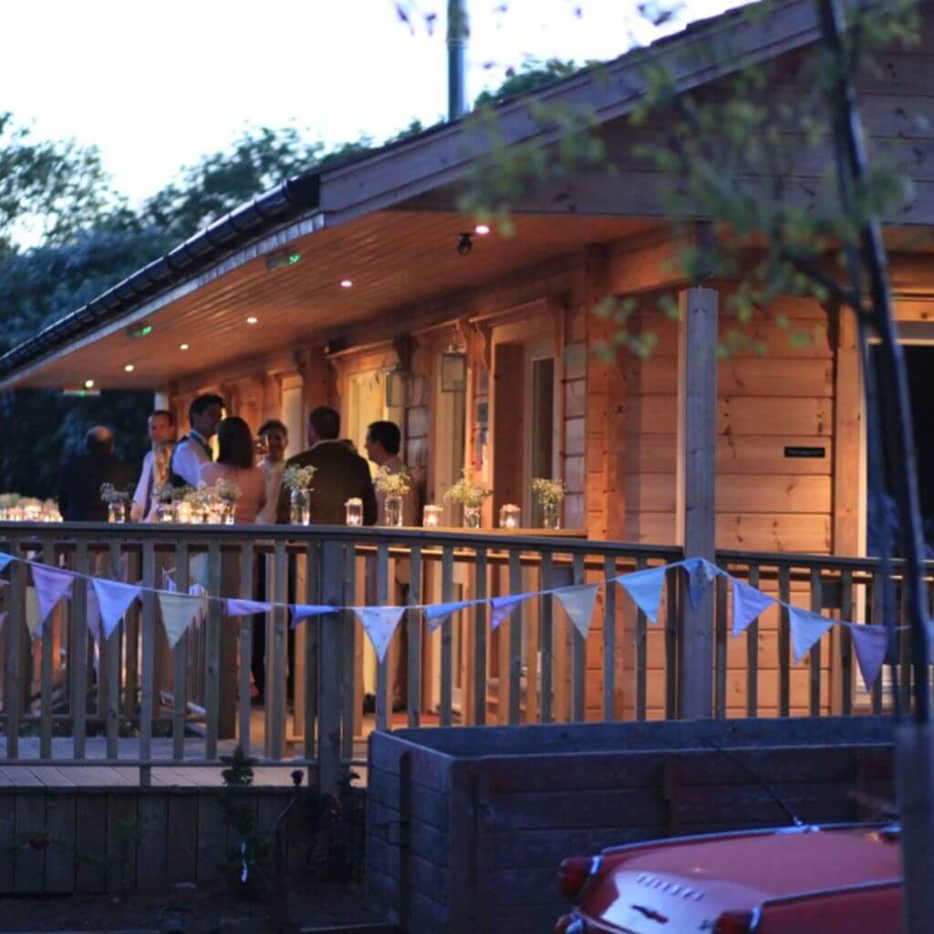 wedding reception at the hideaway at baxby manor with bunting and fairy lights 