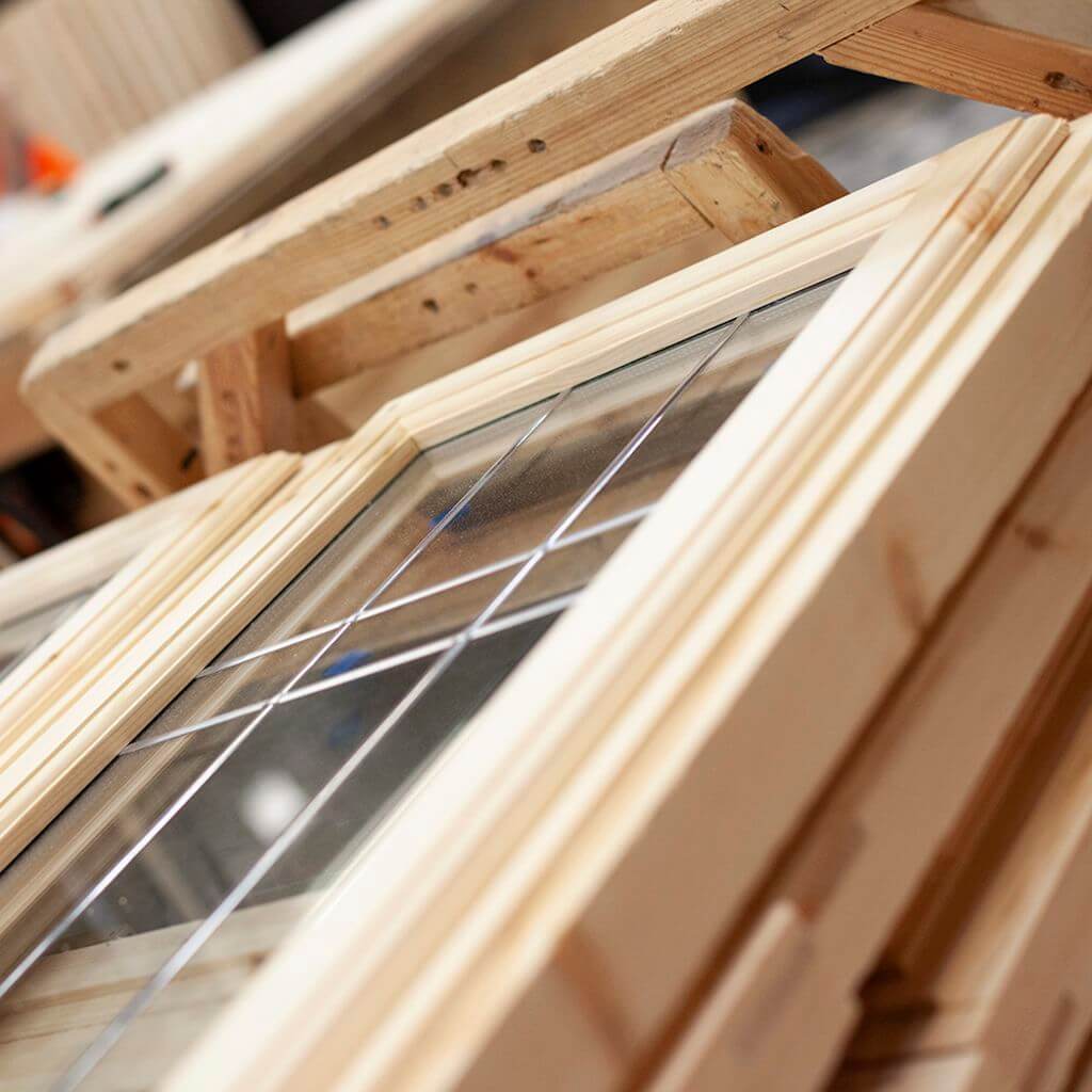 timber framed double glazed windows at Cabin Master factory