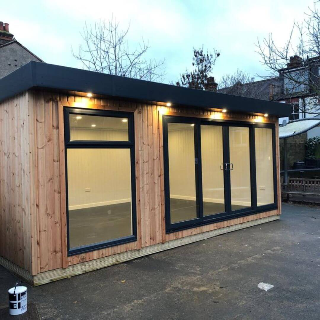 Sudbourne Primary extra classroom cabins for schools building with playground area and spotlights and overhang