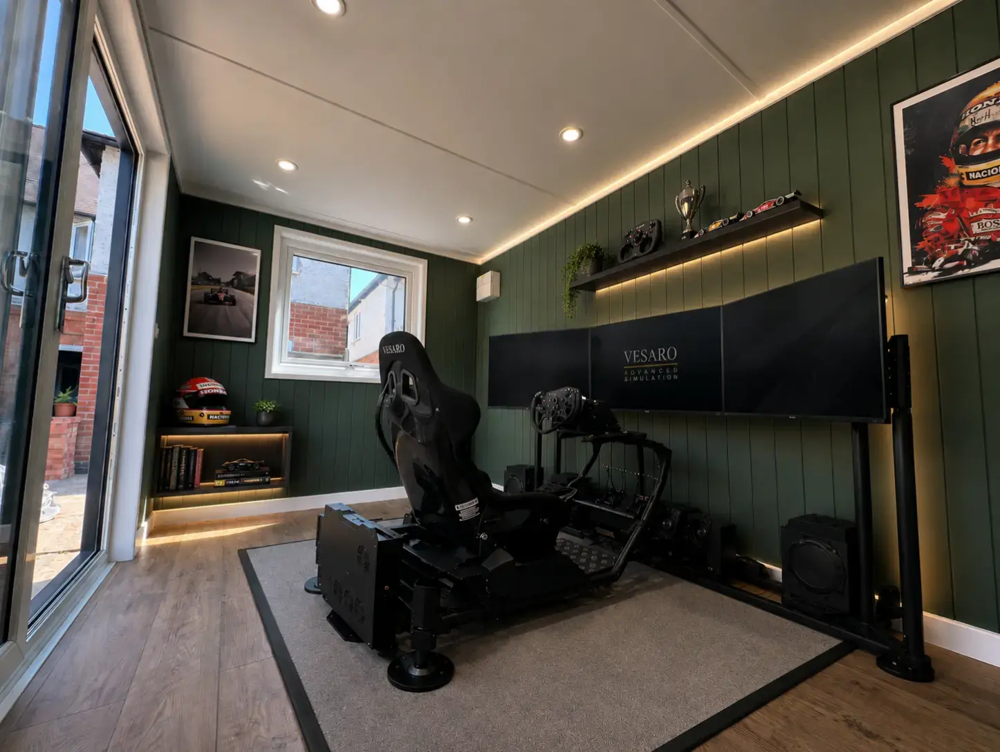 modern garden room with a driving simulator in it